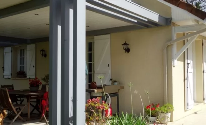 Création et construction d'une couverture de terrasse bois métal  à Artix